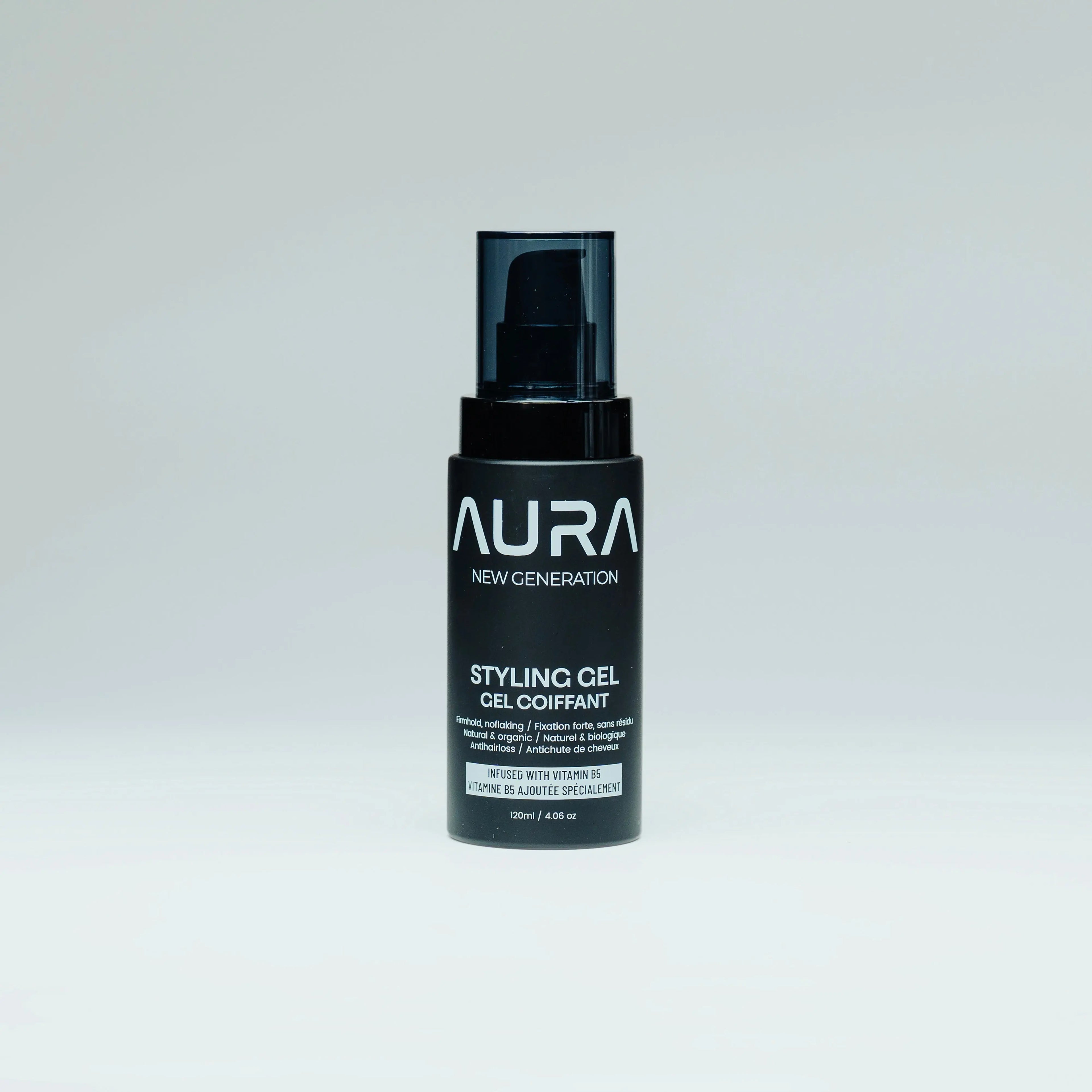 Black bottle of Aura New Generation Styling Gel on a light gray background