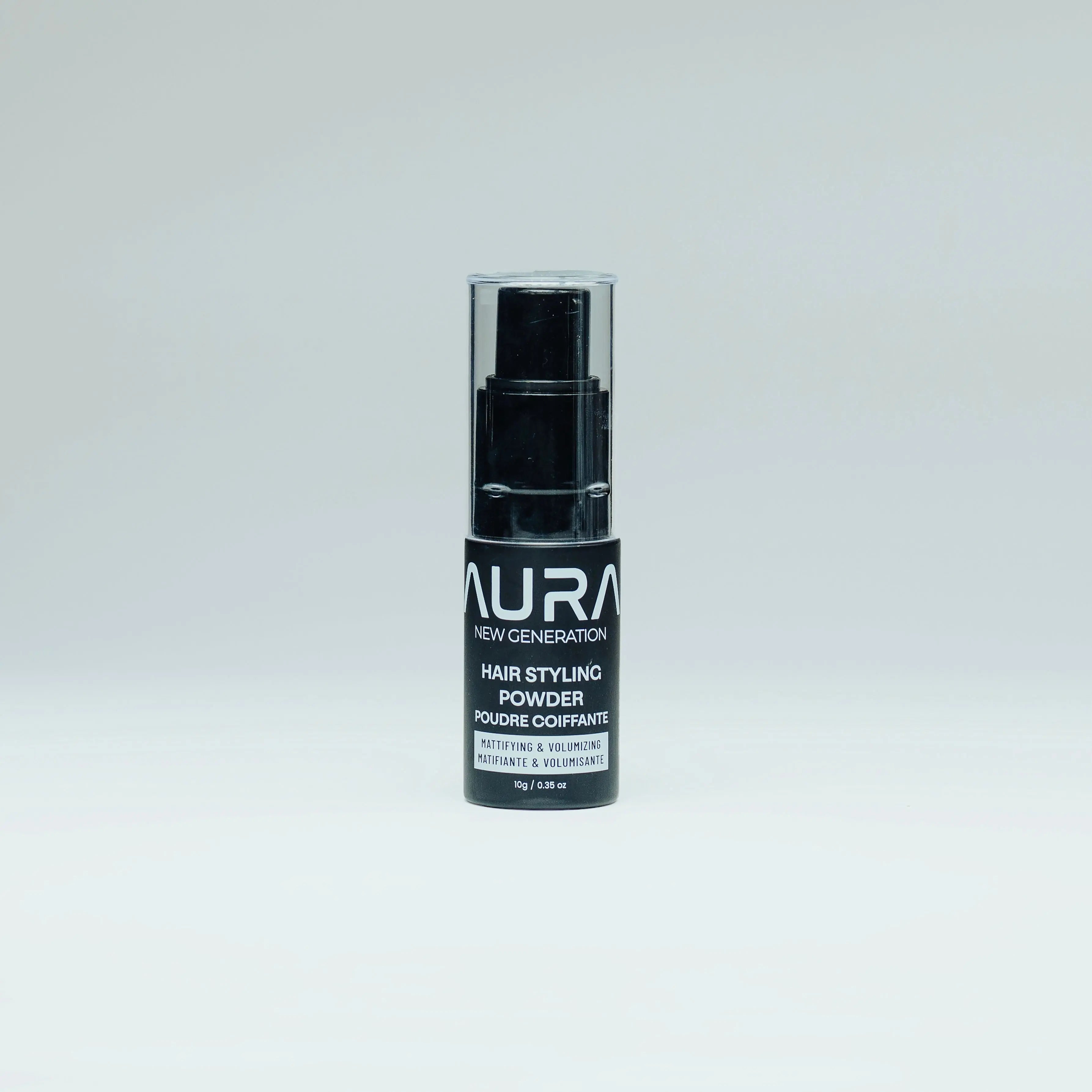 Aura hair styling powder product bottle on a gray background